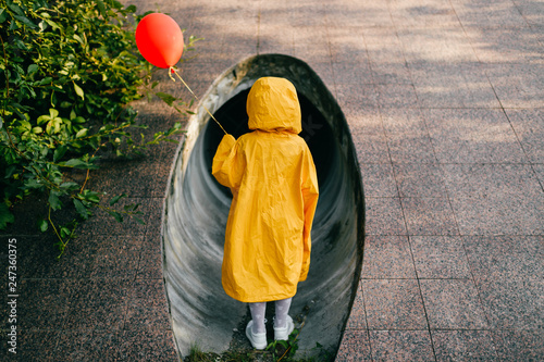 oversized yellow raincoat