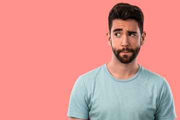 young man thinking and doubting