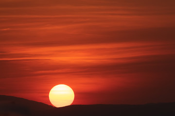 Sunset with the sun touching the horizon