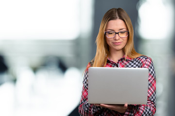 Young female working on laptop