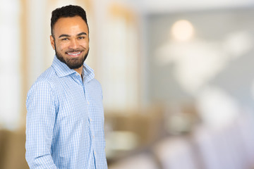 Obraz premium Handsome cheerful african american executive business man