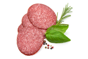 Tasty Salami Sausage slices with herbs and peppercorns, top view, isolated on a white background