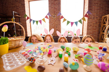 Close up photo three little girls children day wondered two mommy hiding half face tricky cunning pretty table craft big wooden having good great time together playing fooling around