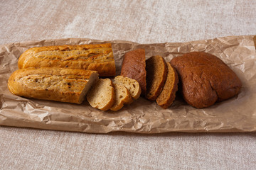 bread ciabatta slices food background brown paper canvas wheat bran graine yeast leaven