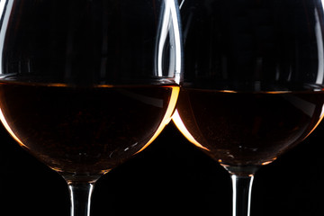 Glasses of wine in darkness