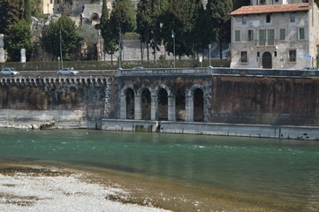 Obraz premium Rio Adige At Its Pass In Verona. Travel, holidays, architecture. March 30, 2015. Verona, Veneto region, Italy.