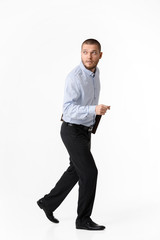 bearded businessman with leather case running on white background