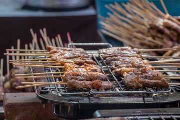 Barbecue, grill and food concept.Beef steaks on the grill with flame.