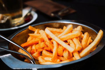 Golden French fries potatoes ready to be eaten