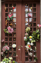 Fototapeta na wymiar Beautiful ornate tomb door in the Pere Lachaise cemetery. Paris