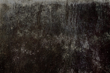 Black grungy wall background or texture