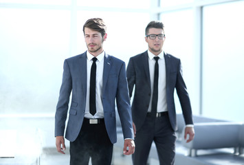 Fototapeta premium young engineers in the office, smoke