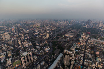 Fototapeta premium Bangkok city building in haze with air pollution PM2.5 problem