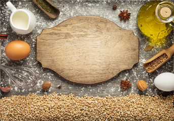 bakery ingredients on wooden background