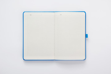 notebook at white background - obrazy, fototapety, plakaty