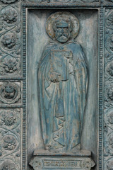 Fototapeta na wymiar Saint Matthew, detail of door of Saint Vincent de Paul church, Paris