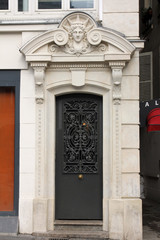 Fototapeta premium Old Black Metal Door in Paris, France