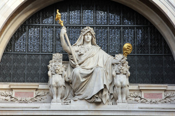 Statue of prudence on the BNP building in Paris  - obrazy, fototapety, plakaty