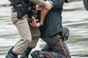 Police steel handcuffs,Police arrested,Police arrested the wrongdoer. 