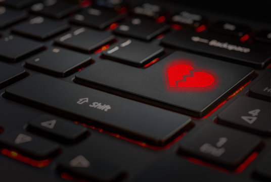 red broken heart in keyboard pc, key enter