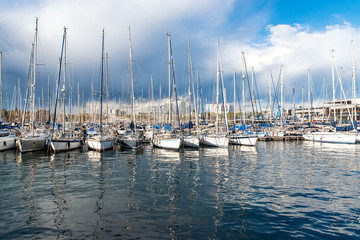 Fototapeta na wymiar Port with yachts in Barcelona, Spain -13 May 2018..