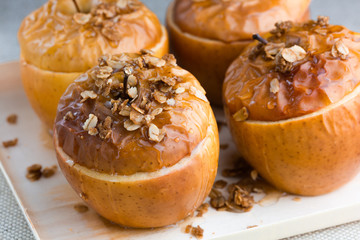 Baked delicious apples with granola. Healthy eating option