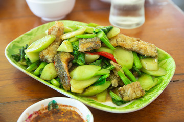 Stir-fried kale with sun-dried crispy fish