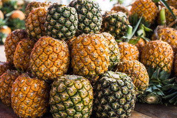 Fresh pineapple for sale is background