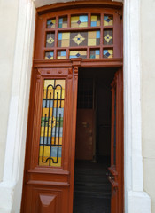 Fototapeta na wymiar old colored glass door. wood vintage design