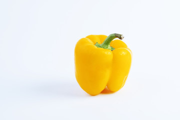 sweet yellow pepper white background, pepper with dew drops, fresh vegetable