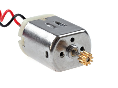 Small size direct current motor, with red and black wires, isolated on white. The kind of motor used in many electronics and student projects.