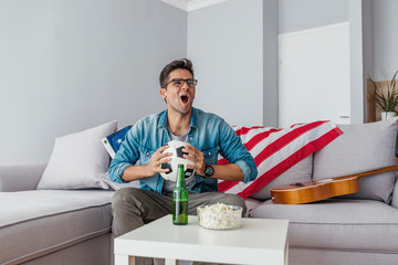 Man watching football at home