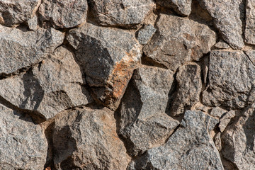Fragment of a wall from a chipped stone.