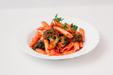 European international fusion cuisine, a beautiful dish on a white plate decorated with herbs and...
