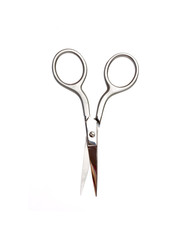 Small steel nail scissors on white background