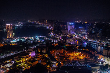 18/11/2018 Cairo, Egypt, incredible skyscraper view of a night city with lots of city lights - obrazy, fototapety, plakaty