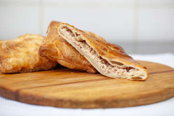 Hotcakes with fill, traditional English Georgian khachapuri Russian appetizer