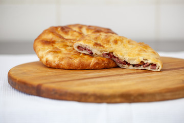Hotcakes with fill, traditional English Georgian khachapuri Russian appetizer