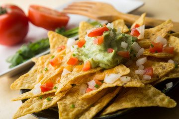 Nachos with guacamole Spanish Tapas.
