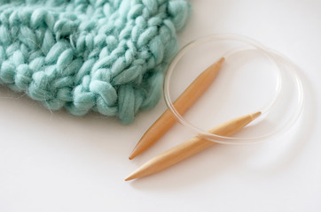 knitting wool yarn turquoise on a light background