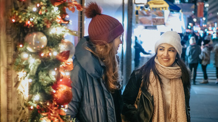 Two girls do Christmas Shopping in New York