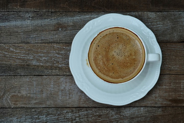 Special recipe hot latte in white coffee cup and space for write wording served in a restaurant, popular drink for meeting place, value added, coffee shop is very big and fast growing business