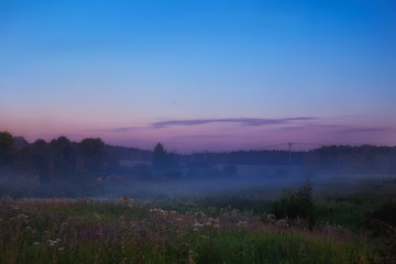 dawn with fog in the field