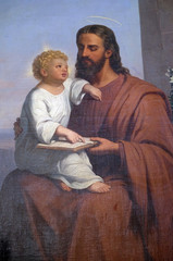 Saint Joseph holding child Jesus altarpiece in the Parish Church of Saint Francis Xavier in...