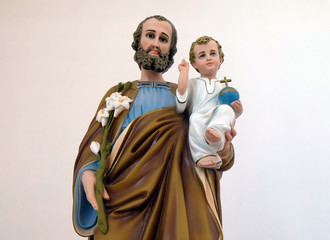 Saint Joseph holding baby Jesus, statue in the Church of Saint Francis of Assisi in Lipik, Croatia 