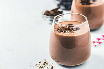 Chocolate frozen cherry chia seeds smoothie. Selective focus, space for text.