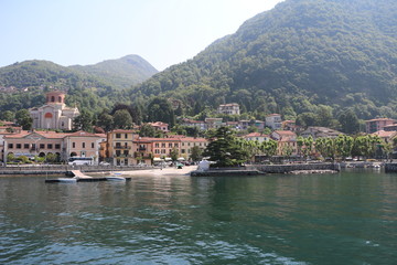 Fototapeta na wymiar View from a ferry to Laveno Mombello on Lake Maggiore, Italy