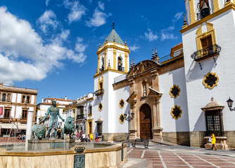 Obraz premium The Plaza del Socorro, a pretty little square surrounded by bars and restaurants terraces in Ronda, Province of Malaga, Spain