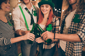 Close up photo company together st paddy day leprechaun costumes telling toast irish tradition culture carefree guys best weekend vacation hands raise beer bottles festive