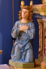 Angel statue on the altar in the church of Saint Matthew in Stitar, Croatia